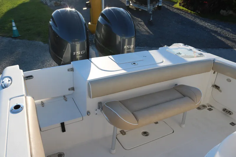 Slide: The Image of 2016 Sea Hunt Gamefish 25 boat interior with twin Yamaha 150 engines. - 11