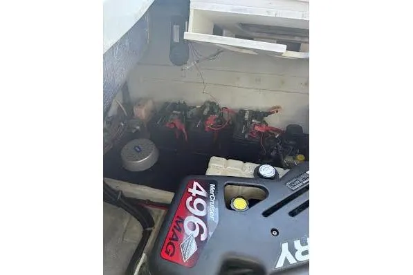 Slide: The Image of Engine compartment of a 2006 Chris Craft Corsair Heritage with wiring and fire extinguisher. - 36