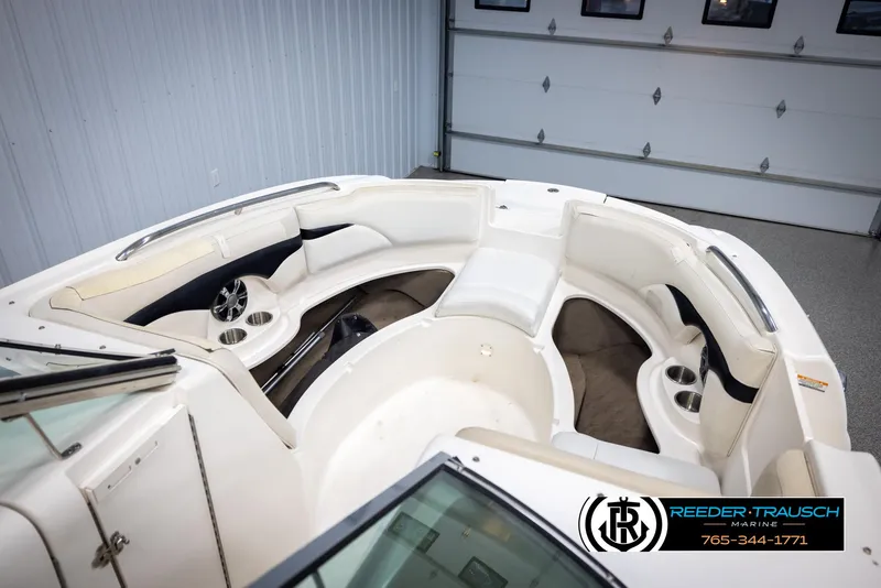 Slide: The Image of Interior view of 2002 Chaparral 243 Sunesta boat with seating and cup holders. - 20