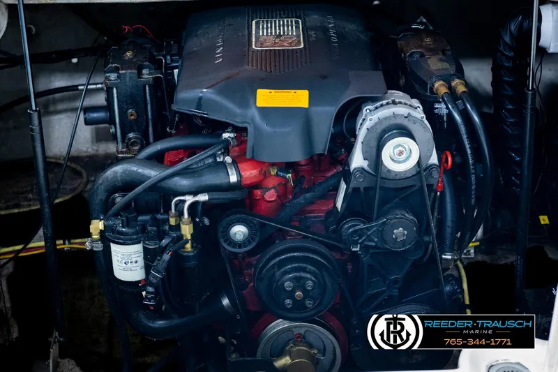 Slide: The Image of Engine of a 2002 Chaparral 243 Sunesta boat, detailed view with components. - 47