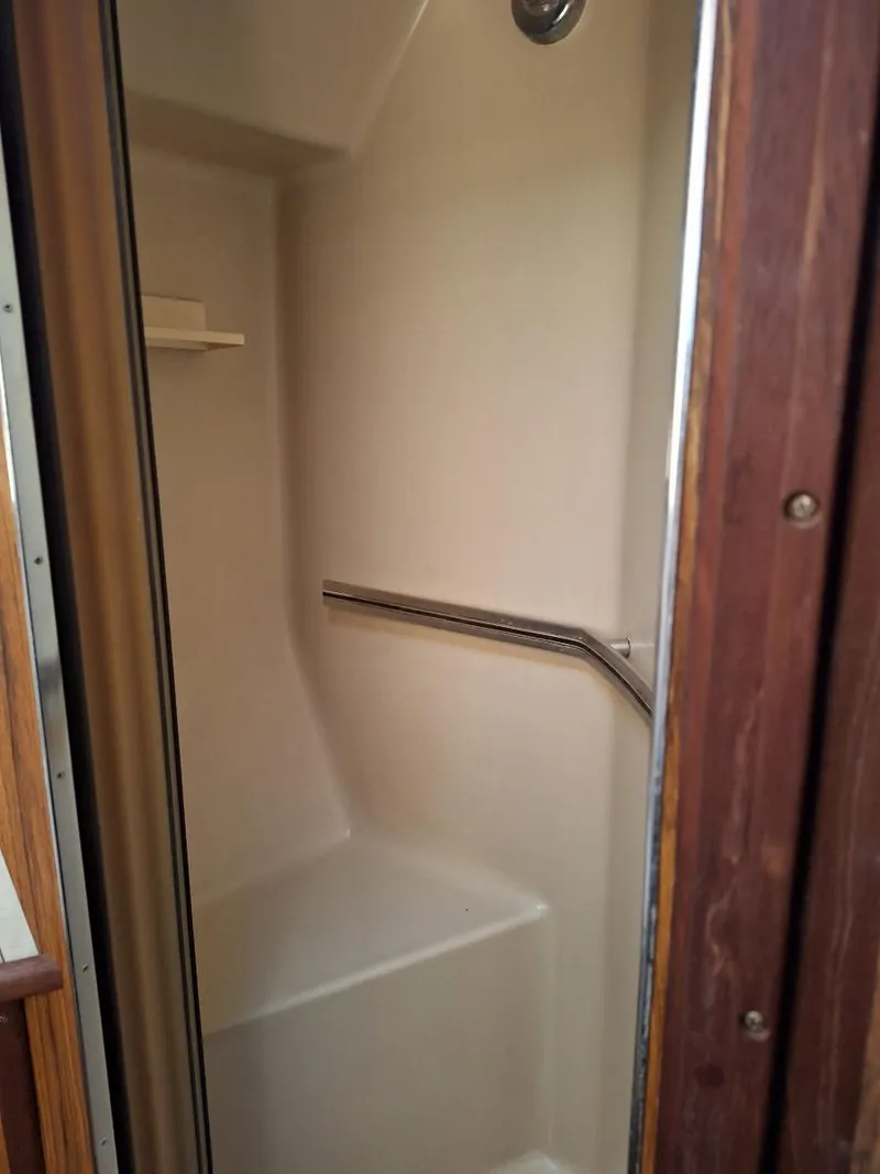Slide: The Image of Shower area in 1985 Sea Ray 390 Express Cruiser boat. - 16