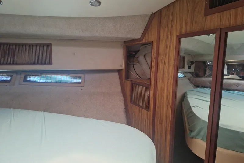 Slide: The Image of Batteries in 1985 Sea Ray 390 Express Cruiser engine compartment. - 28
