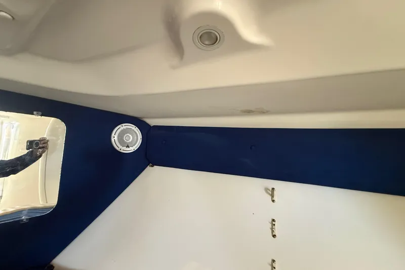 Slide: The Image of 2008 Intrepid 377 Walkaround cabin interior with speaker and mirror. - 160