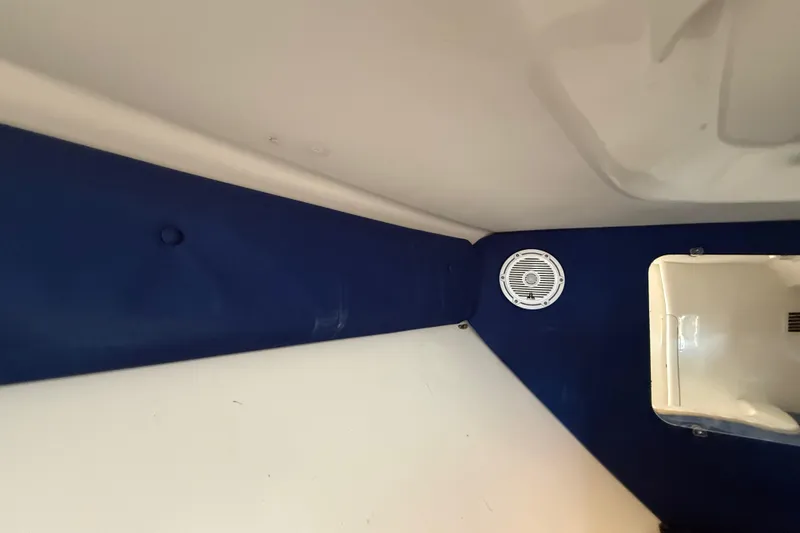 Slide: The Image of Interior view of 2008 Intrepid 377 Walkaround boat with blue and white design. - 161