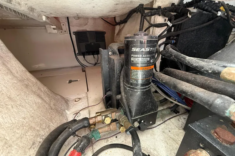 Slide: The Image of 2008 Intrepid 377 Walkaround engine compartment with SeaStar power assist system. - 169