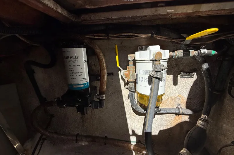 Slide: The Image of Engine compartment of a 2008 Intrepid 377 Walkaround with fuel filter and pump system. - 181