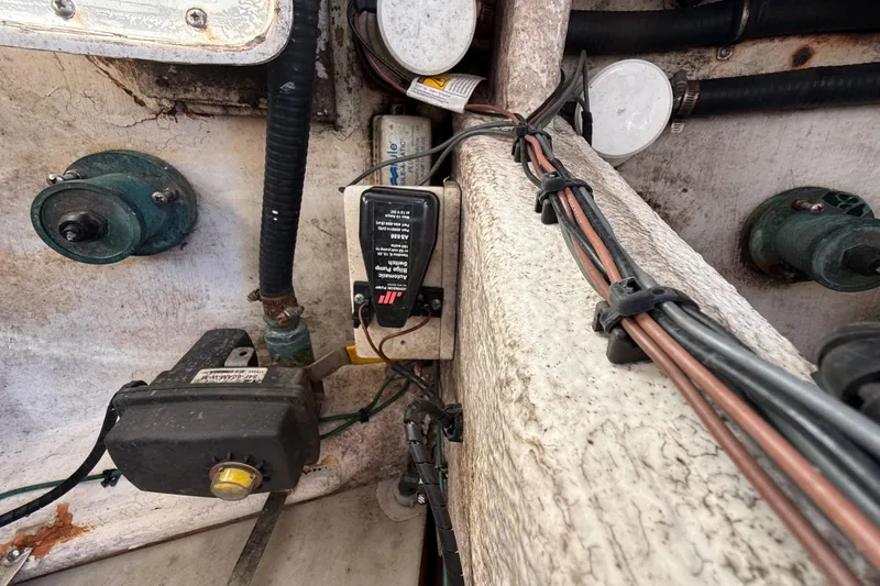 Slide: The Image of 2008 Intrepid 377 Walkaround boat interior wiring and components close-up. - 183