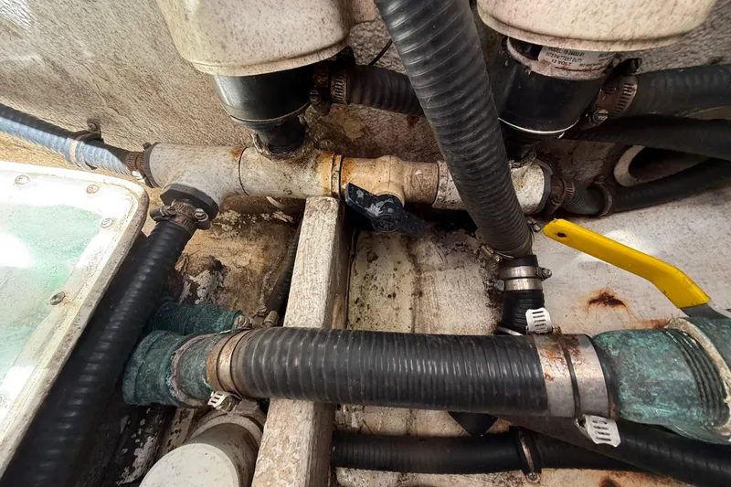 Slide: The Image of Engine compartment of a 2008 Intrepid 377 Walkaround with hoses and fittings. - 187