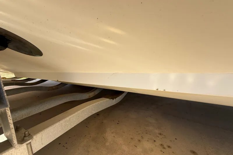 Slide: The Image of 2008 Intrepid 377 Walkaround boat hull on trailer, close-up view. - 207