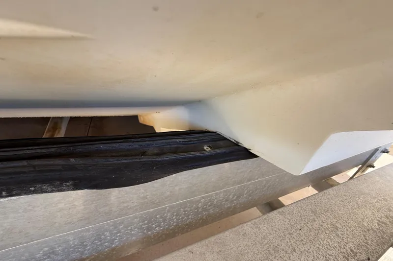 Slide: The Image of Close-up of a 2008 Intrepid 377 Walkaround boat hull detail. - 209