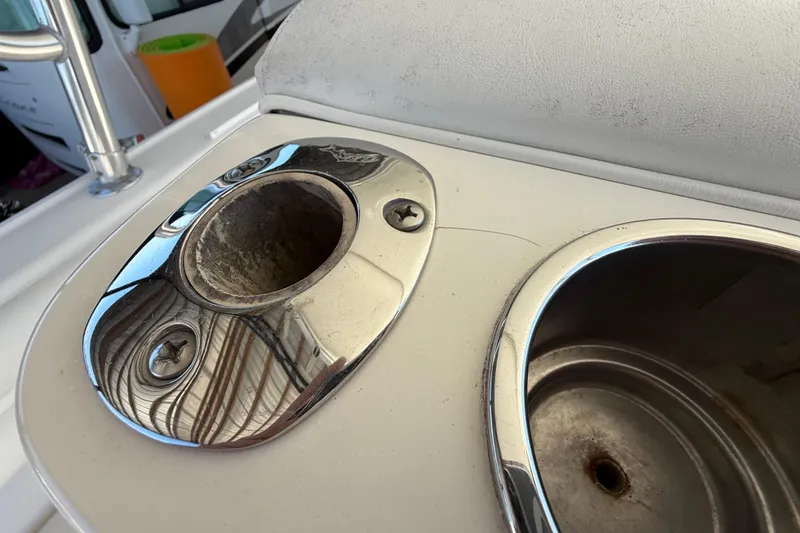 Slide: The Image of 2008 Intrepid 377 Walkaround boat detail with stainless steel cup holders. - 213