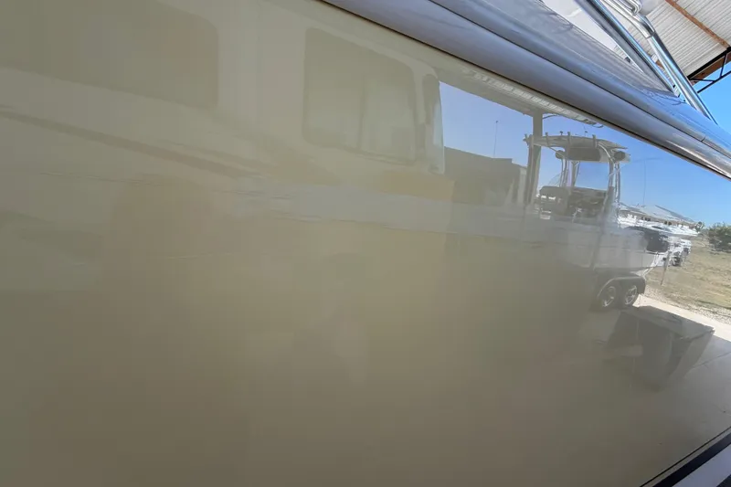 Slide: The Image of 2008 Intrepid 377 Walkaround boat hull reflecting surroundings. - 217