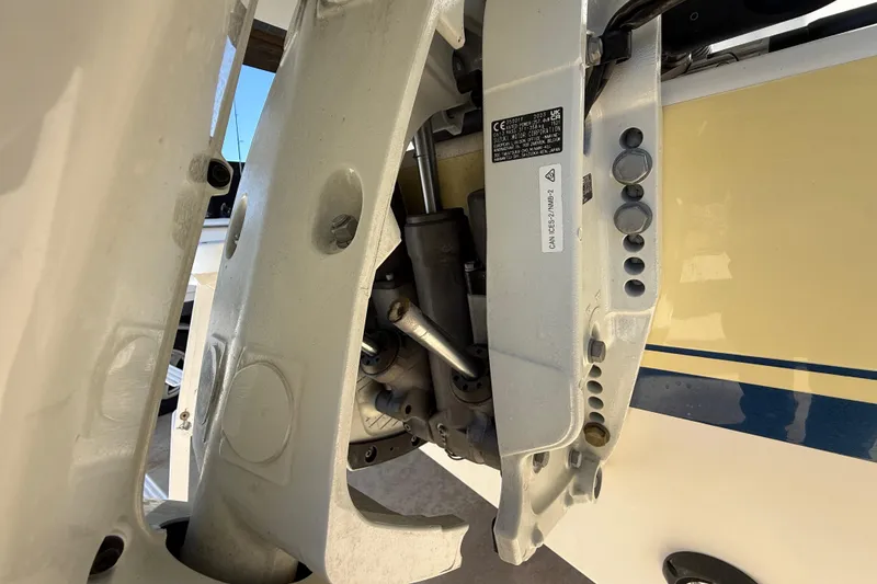 Slide: The Image of 2008 Intrepid 377 Walkaround boat engine detail with visible components and labels. - 222