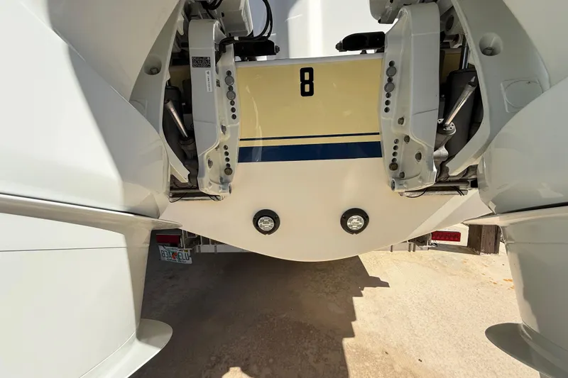 Slide: The Image of Rear view of a 2008 Intrepid 377 Walkaround boat with dual engines. - 223
