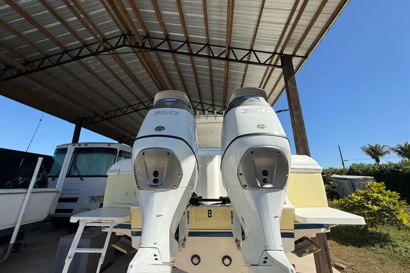 Slide: The Image of 2008 Intrepid 377 Walkaround with twin 350 engines under a metal canopy. - 29