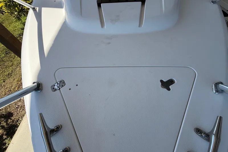 Slide: The Image of 2008 Intrepid 377 Walkaround boat deck with hatch and stainless steel fittings. - 45