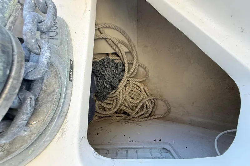 Slide: The Image of Anchor chain and rope storage on a 2008 Intrepid 377 Walkaround boat. - 49