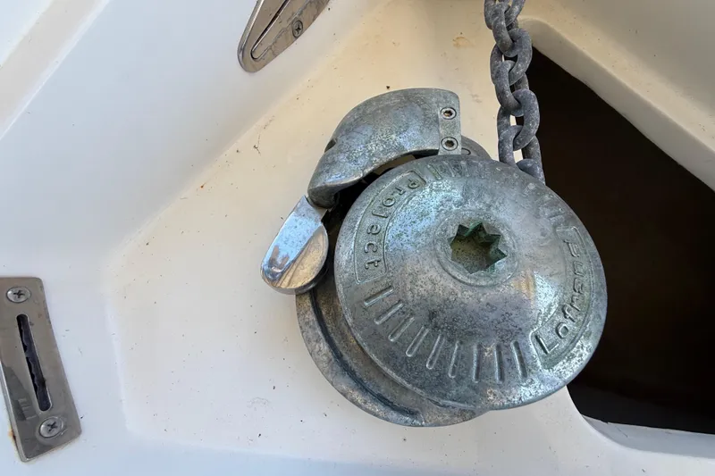 Slide: The Image of Anchor windlass on 2008 Intrepid 377 Walkaround boat deck. - 50