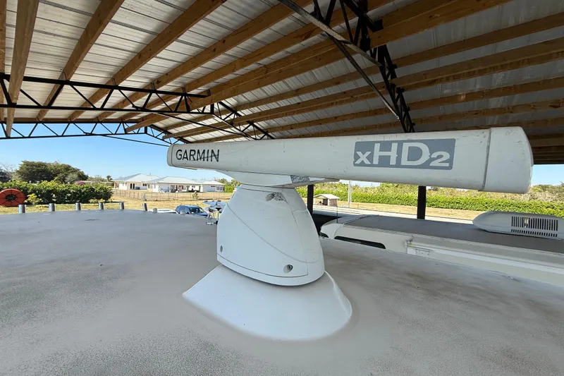 Slide: The Image of Garmin xHD2 radar on 2008 Intrepid 377 Walkaround under a metal roof. - 63