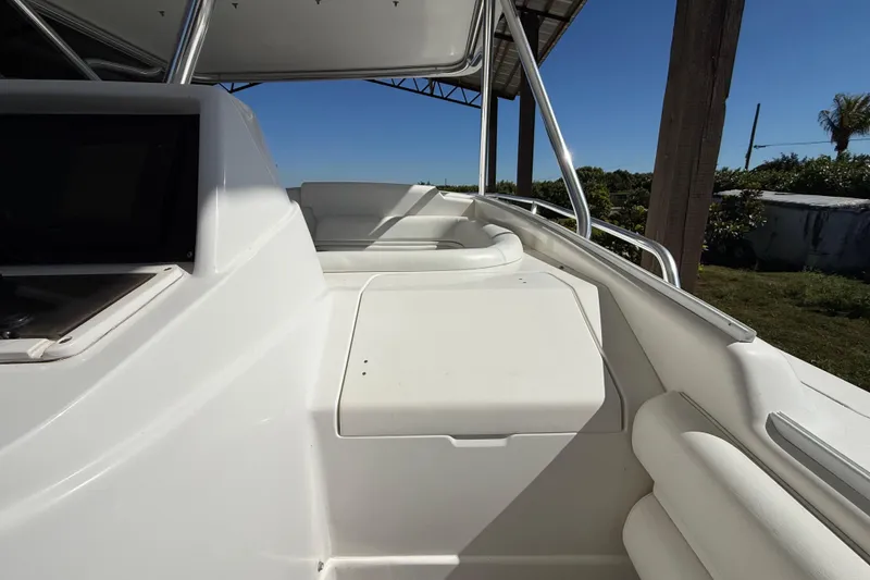 Slide: The Image of 2008 Intrepid 377 Walkaround boat deck under sunny sky. - 86