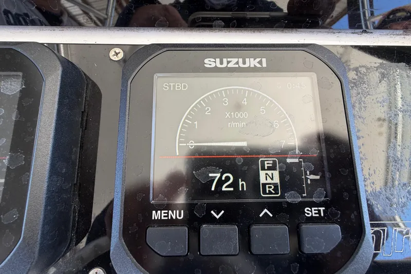 Slide: The Image of Suzuki engine display on 2008 Intrepid 377 Walkaround, showing 72 hours of operation. - 94