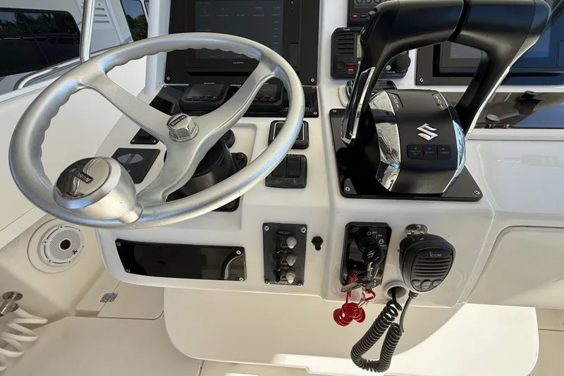 Slide: The Image of 2008 Intrepid 377 Walkaround helm with steering wheel and controls. - 97