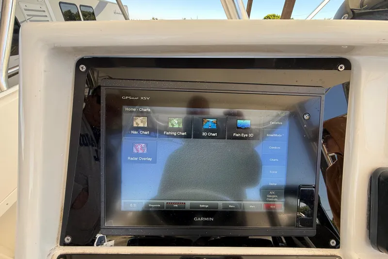 Slide: The Image of Garmin GPS display on 2008 Intrepid 377 Walkaround boat, showing navigation and fishing charts. - 99