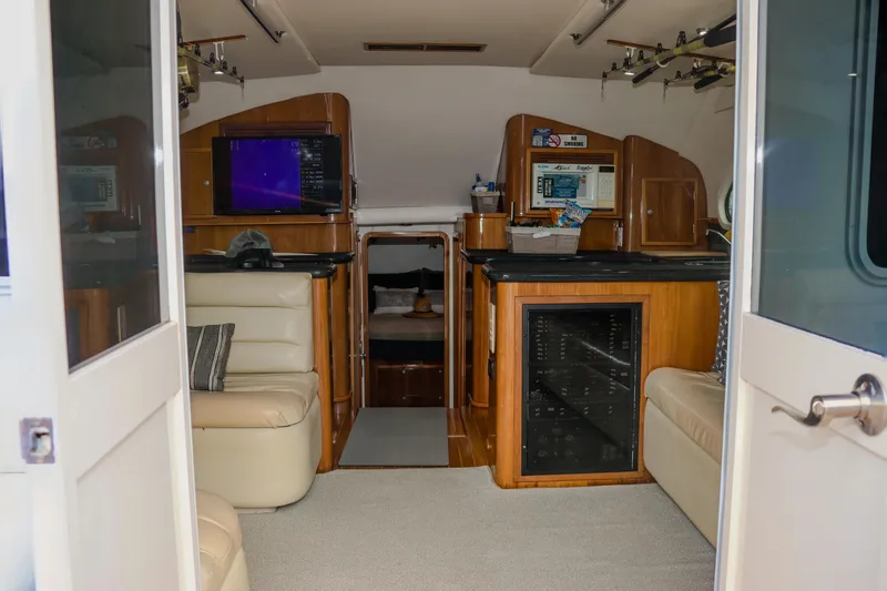 Slide: The Image of Interior of 2001 Black Watch 40 yacht with leather seating and modern amenities. - 11