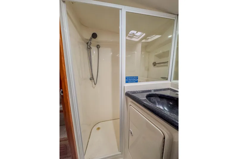 Slide: The Image of Bathroom interior of 2001 Black Watch 40 yacht with shower and sink. - 16