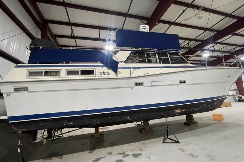 Slide: The Image of 1979 Viking 43 Double Cabin yacht in indoor storage, side view. - 20