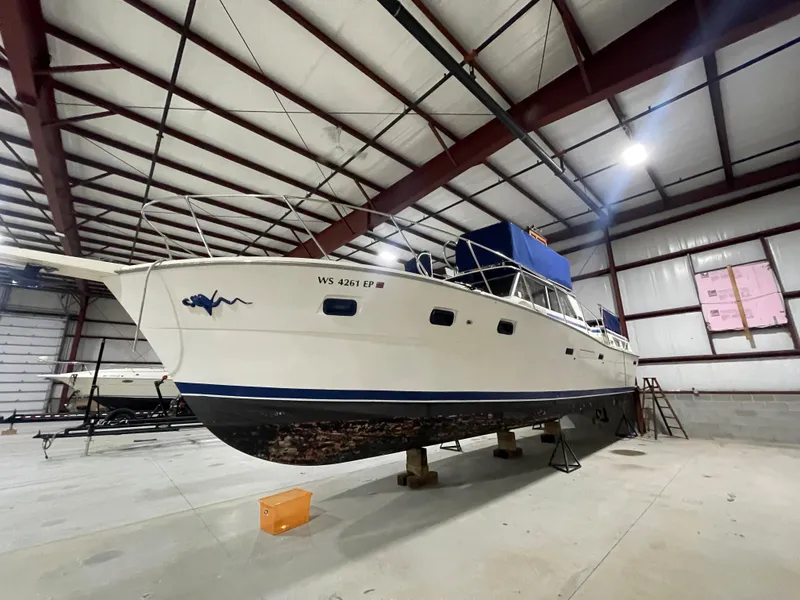 Slide: The Image of 1979 Viking 43 Double Cabin yacht in indoor storage facility. - 5