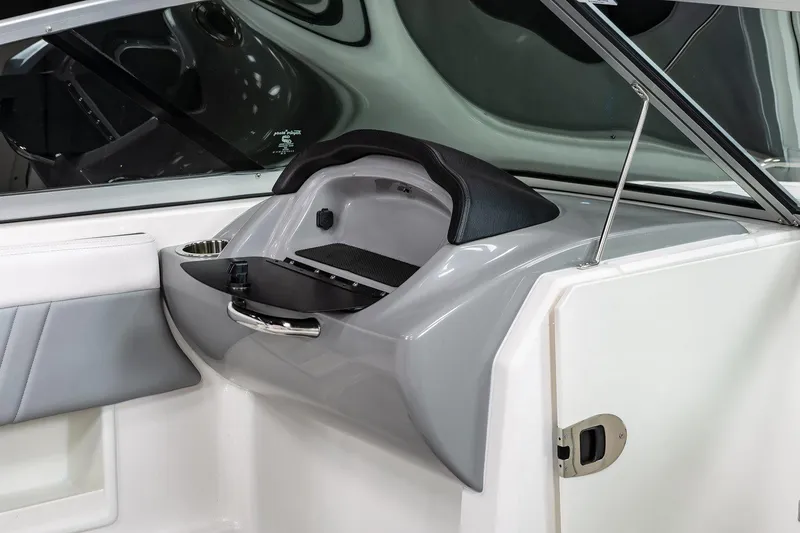 Slide: The Image of 2023 Chaparral 23 Surf boat interior dashboard view. - 3