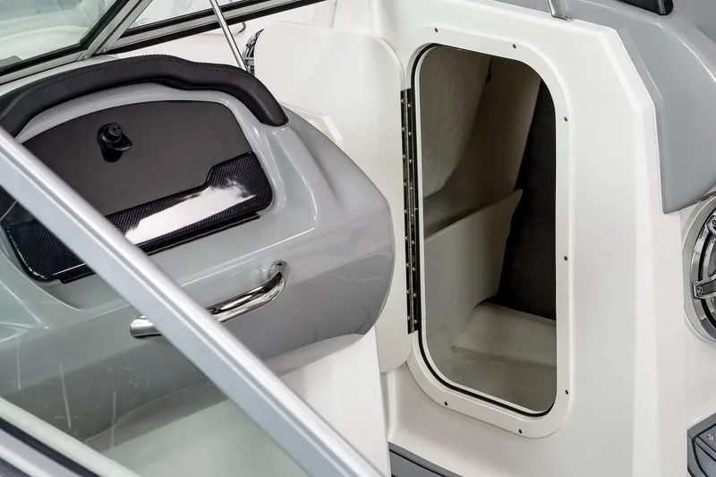 Slide: The Image of Interior of 2023 Chaparral 23 Surf with storage compartment. - 4