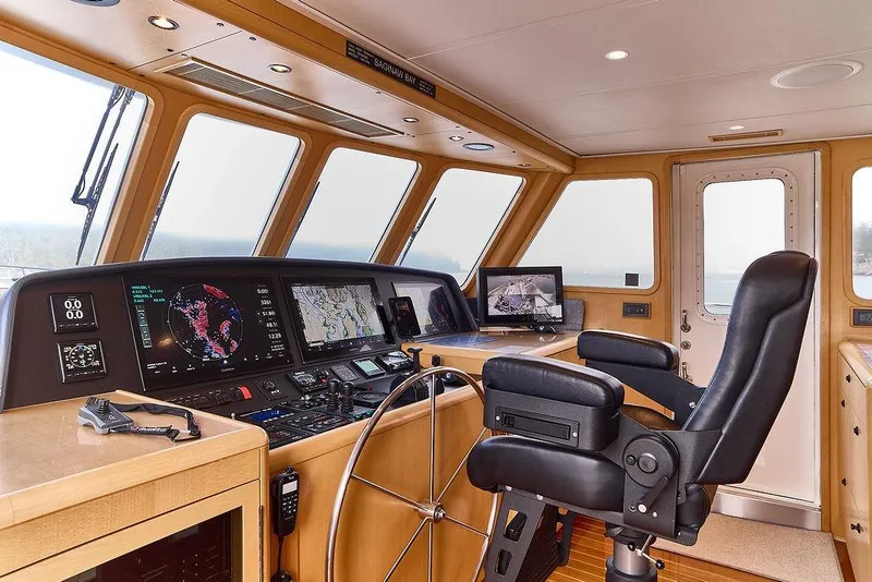 Slide: The Image of Luxurious Northern Marine 75 yacht helm with advanced navigation systems, 2000 model. - 12