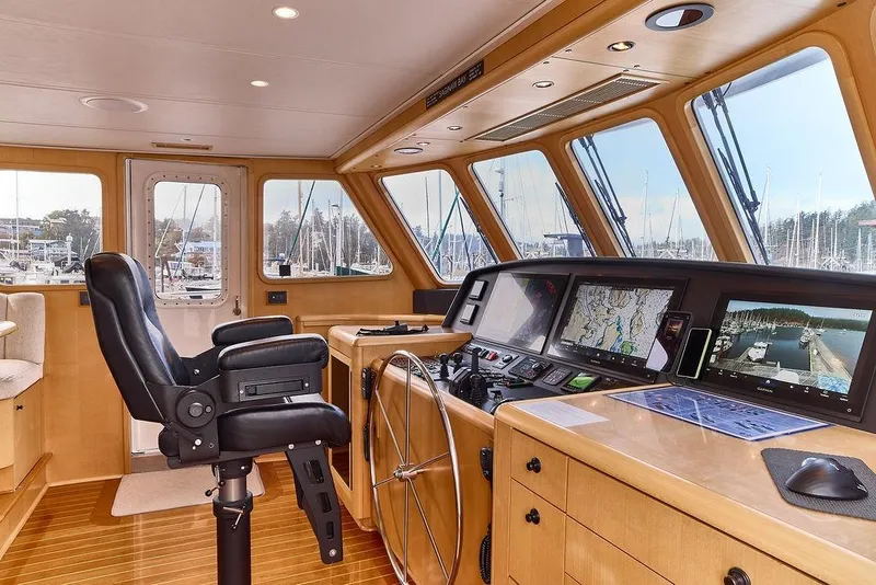 Slide: The Image of Luxurious Northern Marine 75 yacht helm with advanced navigation systems, 2000 model. - 14