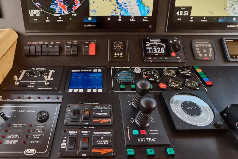 Slide: The Image of Control panel of a 2000 Northern Marine 75 yacht with navigation and monitoring systems. - 17