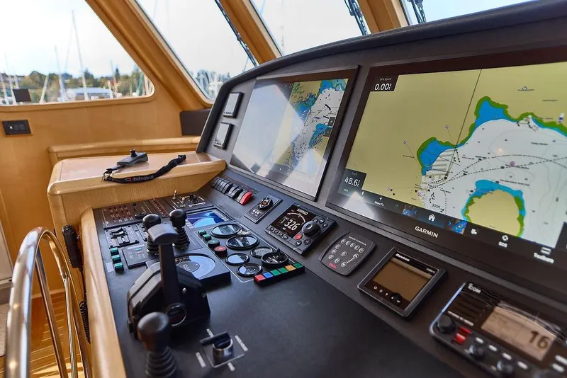 Slide: The Image of Cockpit of 2000 Northern Marine 75 yacht with navigation screens and controls. - 20