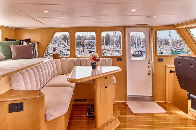 Slide: The Image of Luxurious interior of 2000 Northern Marine 75 yacht with plush seating and elegant decor. - 21