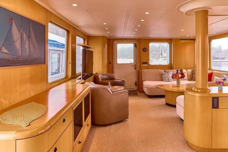 Slide: The Image of Luxurious interior of 2000 Northern Marine 75 yacht with elegant seating and decor. - 26