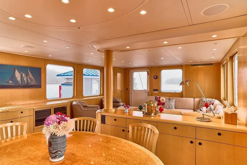 Slide: The Image of Luxurious interior of 2000 Northern Marine 75 yacht with elegant wood finishes and cozy seating. - 29