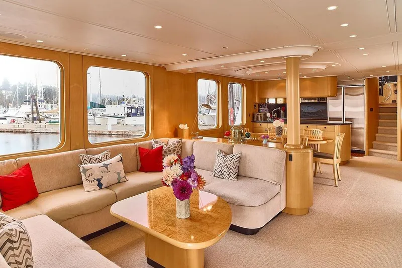 Slide: The Image of Luxurious interior of 2000 Northern Marine 75 yacht with elegant seating and dining area. - 32