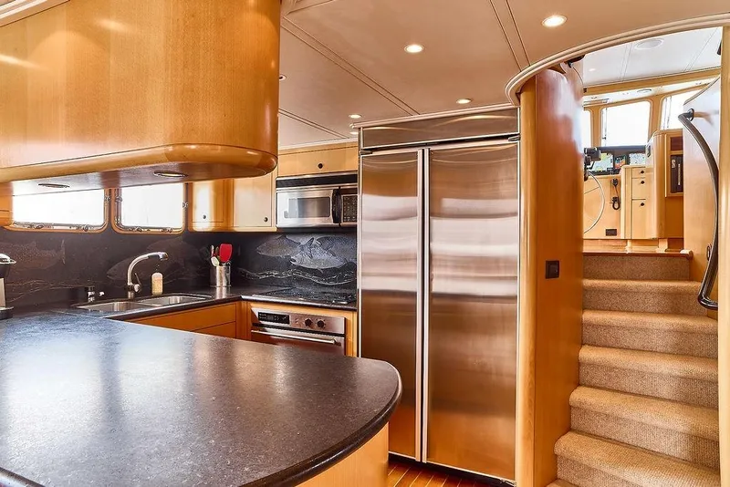 Slide: The Image of Luxurious kitchen interior of 2000 Northern Marine 75 yacht with modern appliances and elegant design. - 34