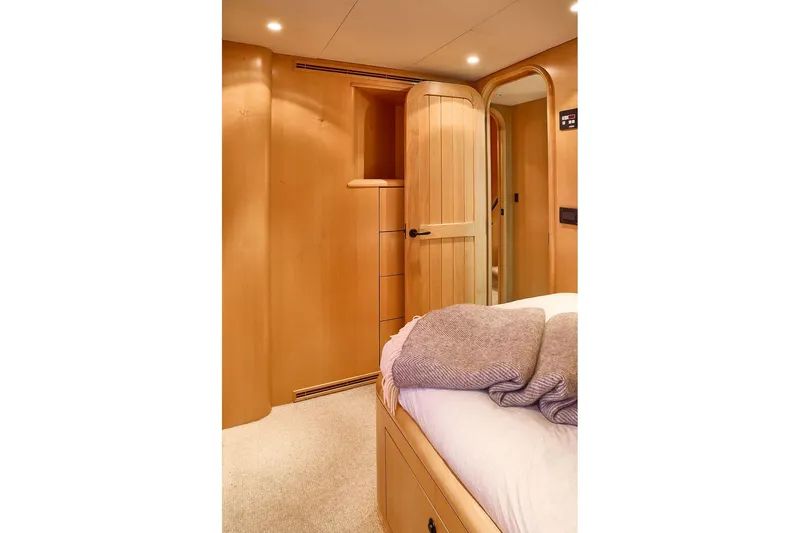 Slide: The Image of Luxurious cabin interior of 2000 Northern Marine 75 yacht with wooden finishes. - 35