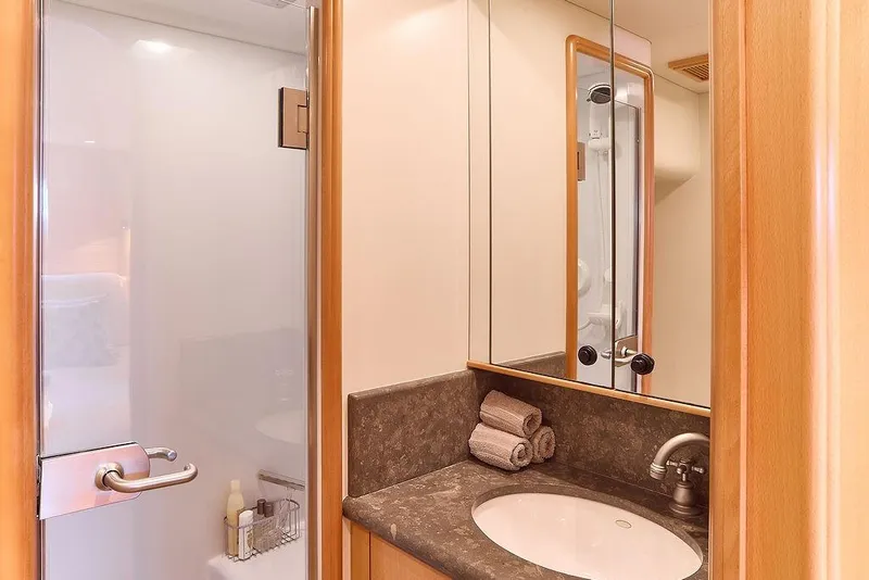 Slide: The Image of Luxurious bathroom in 2000 Northern Marine 75 yacht with modern fixtures and elegant design. - 40
