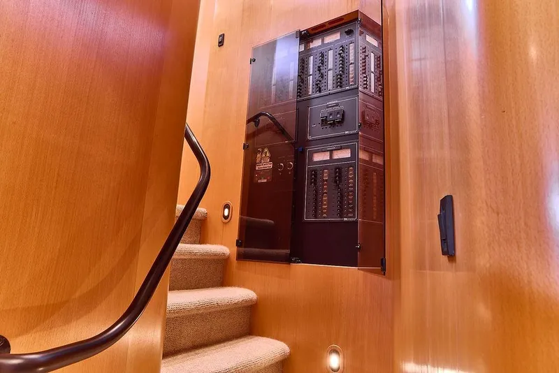 Slide: The Image of Staircase and control panel inside 2000 Northern Marine 75 yacht. - 42