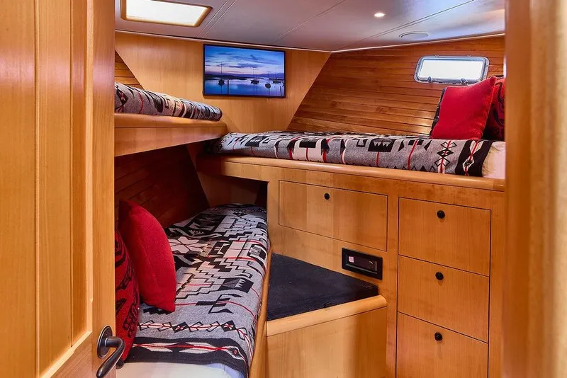 Slide: The Image of Cozy cabin interior of 2000 Northern Marine 75 yacht with wooden finish and bunk beds. - 53