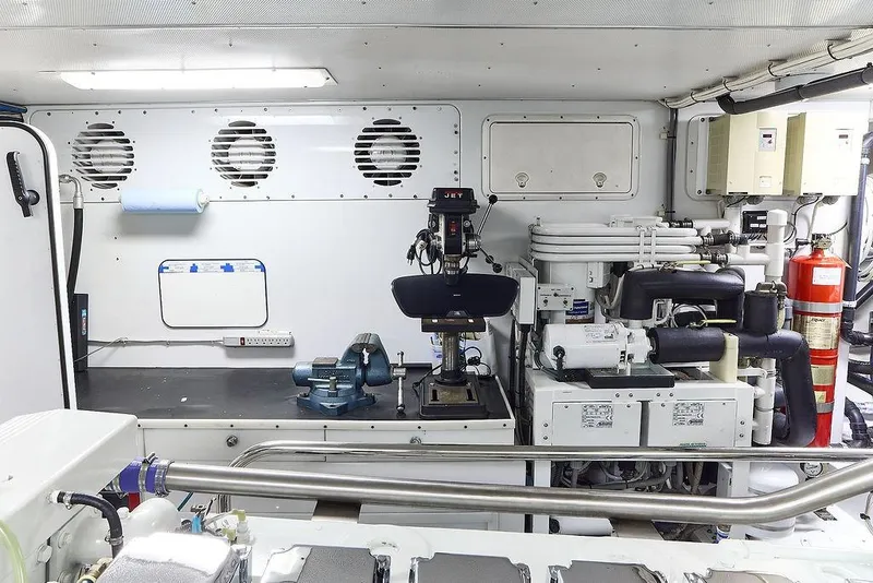 Slide: The Image of Engine room of 2000 Northern Marine 75 yacht with machinery and tools. - 59