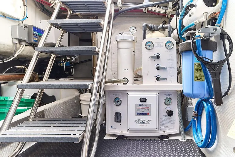 Slide: The Image of Engine room of a 2000 Northern Marine 75 yacht with water filtration system. - 62