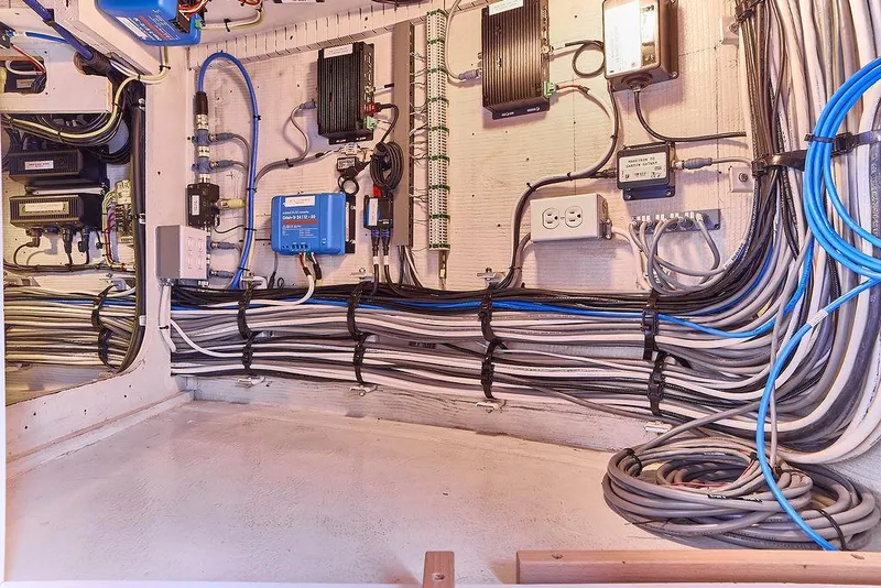 Slide: The Image of Electrical wiring and equipment inside a 2000 Northern Marine 75 yacht. - 66