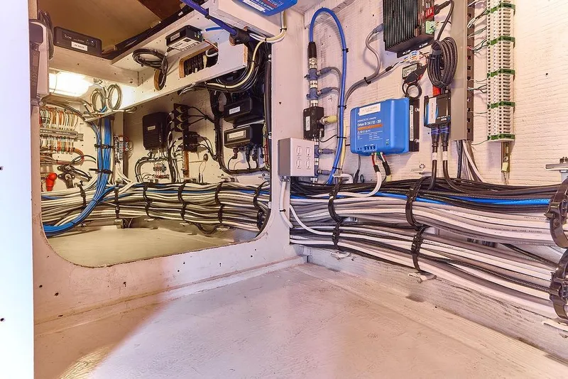 Slide: The Image of Electrical wiring and equipment inside a 2000 Northern Marine 75 yacht. - 67